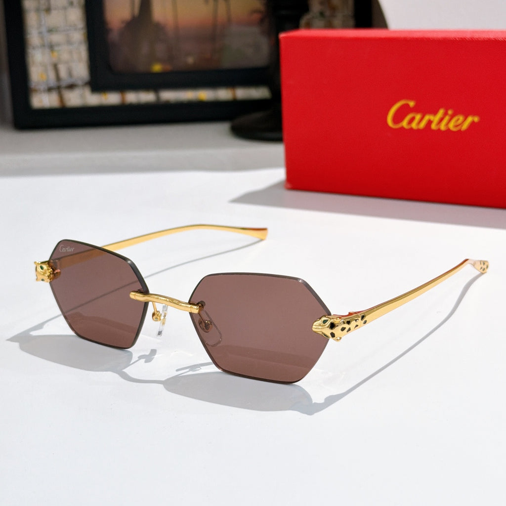 Sunglasses with brown hexagonal lenses and gold-tone ornate temple details
