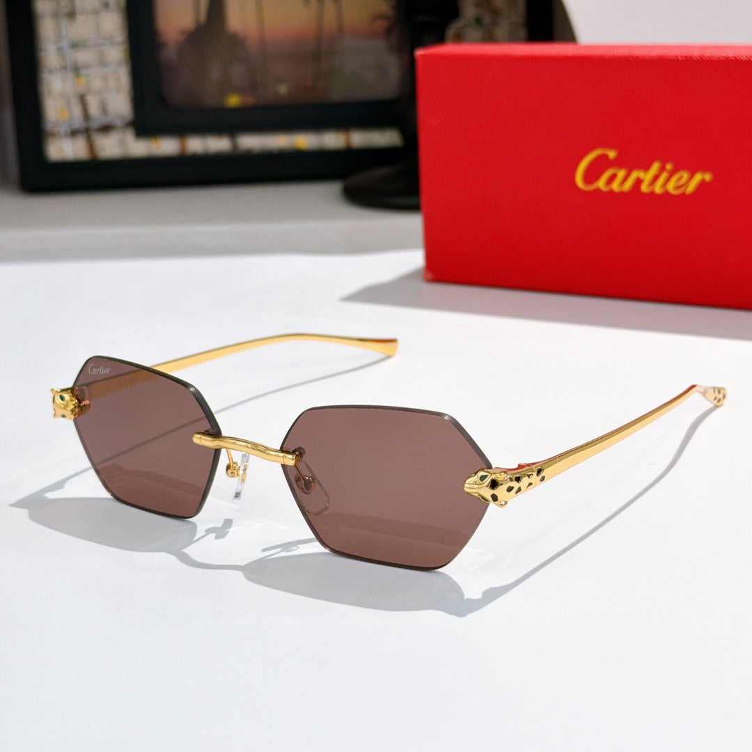 Sunglasses with brown hexagonal lenses and gold-tone ornate temple details