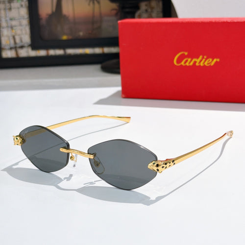 Gold-tone round sunglasses with dark lenses and patterned temple accents