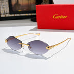 Gold-tone round sunglasses with purple tinted lenses and patterned temple accents