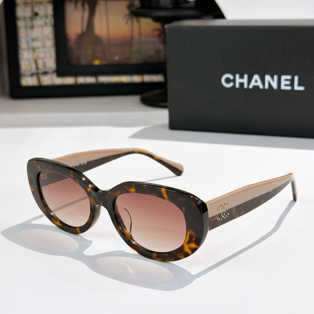 Chanel sunglasses, tortoiseshell frame with rose tinted lenses and studded arms