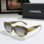 Chanel sunglasses, olive-green frame with light lenses and slim curved arms