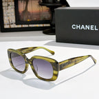 Olive square sunglasses with purple tinted lenses, logo on side temples