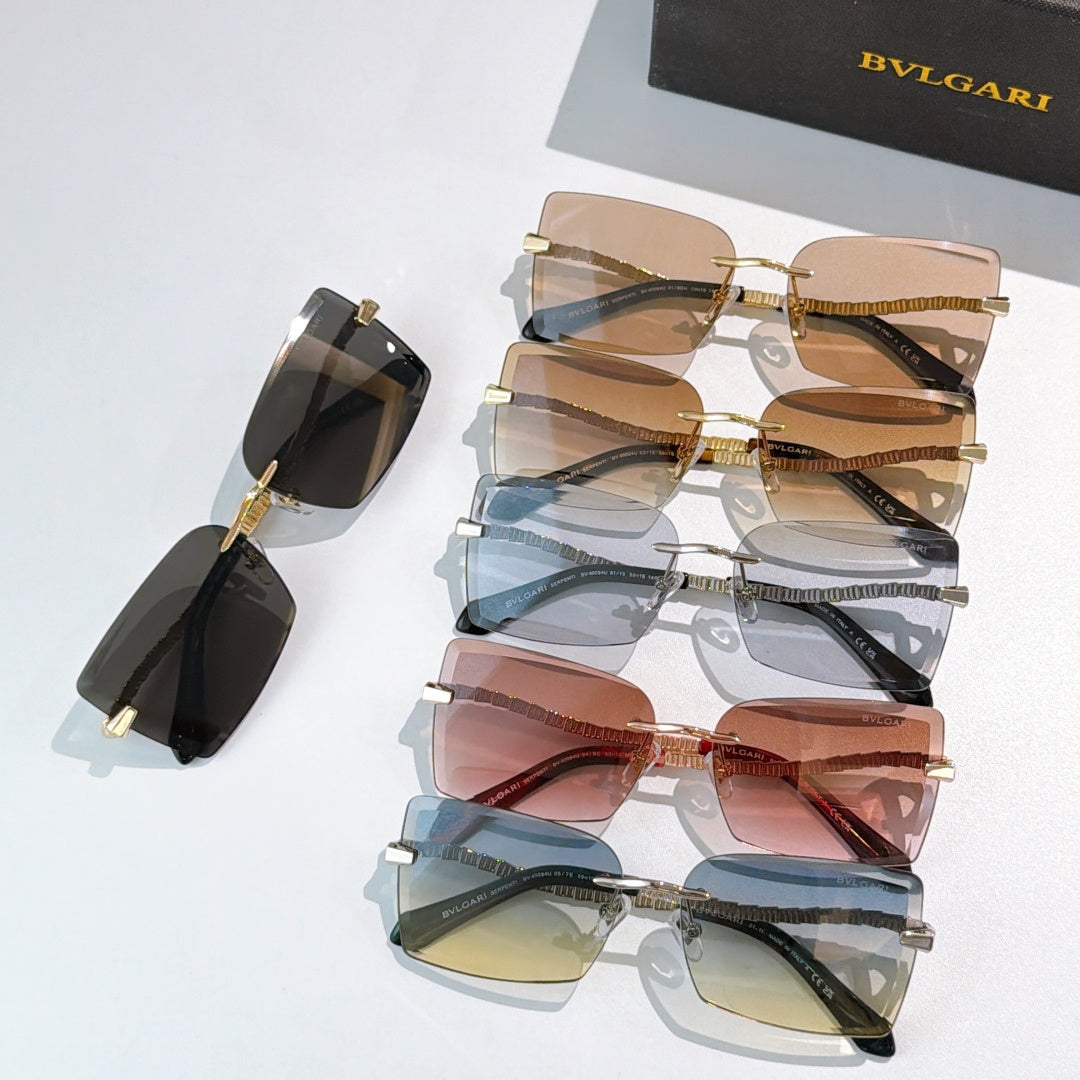 Bvlgari sunglasses stack with mixed tinted lenses and gold chain temple arms