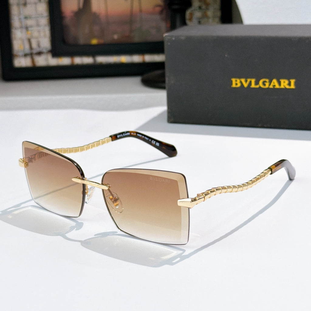 Bvlgari square sunglasses with peach lenses and gold chain temple arms