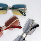 Assorted Bvlgari glasses with tinted lenses and gold chain temples