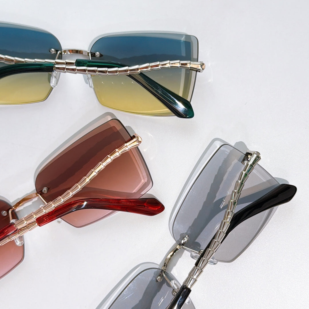 Assorted Bvlgari glasses with tinted lenses and gold chain temples