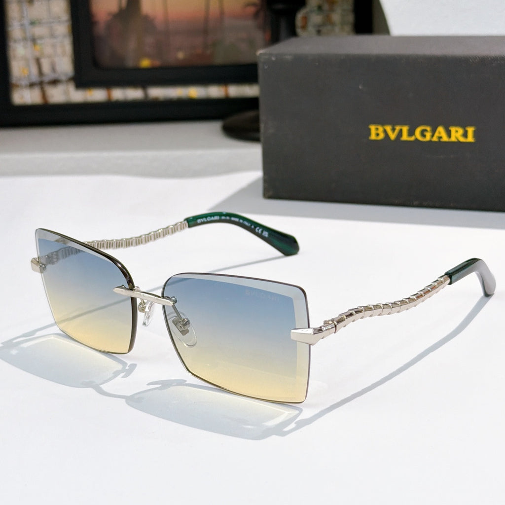 Bvlgari square sunglasses with blue lenses and gold chain temple arms
