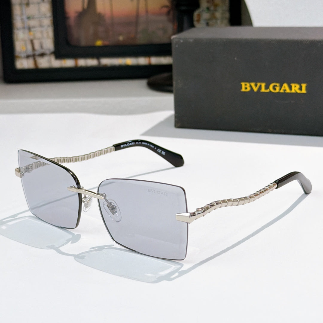 Bvlgari square sunglasses with clear gray lenses and gold chain temple arms