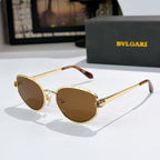 Bvlgari cat-eye glasses with gold frame and brown tinted lenses
