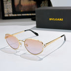 Bvlgari cat-eye glasses with gold frame and pale pink tinted lenses
