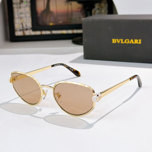 Bvlgari cat-eye glasses with gold frame and amber tinted lenses