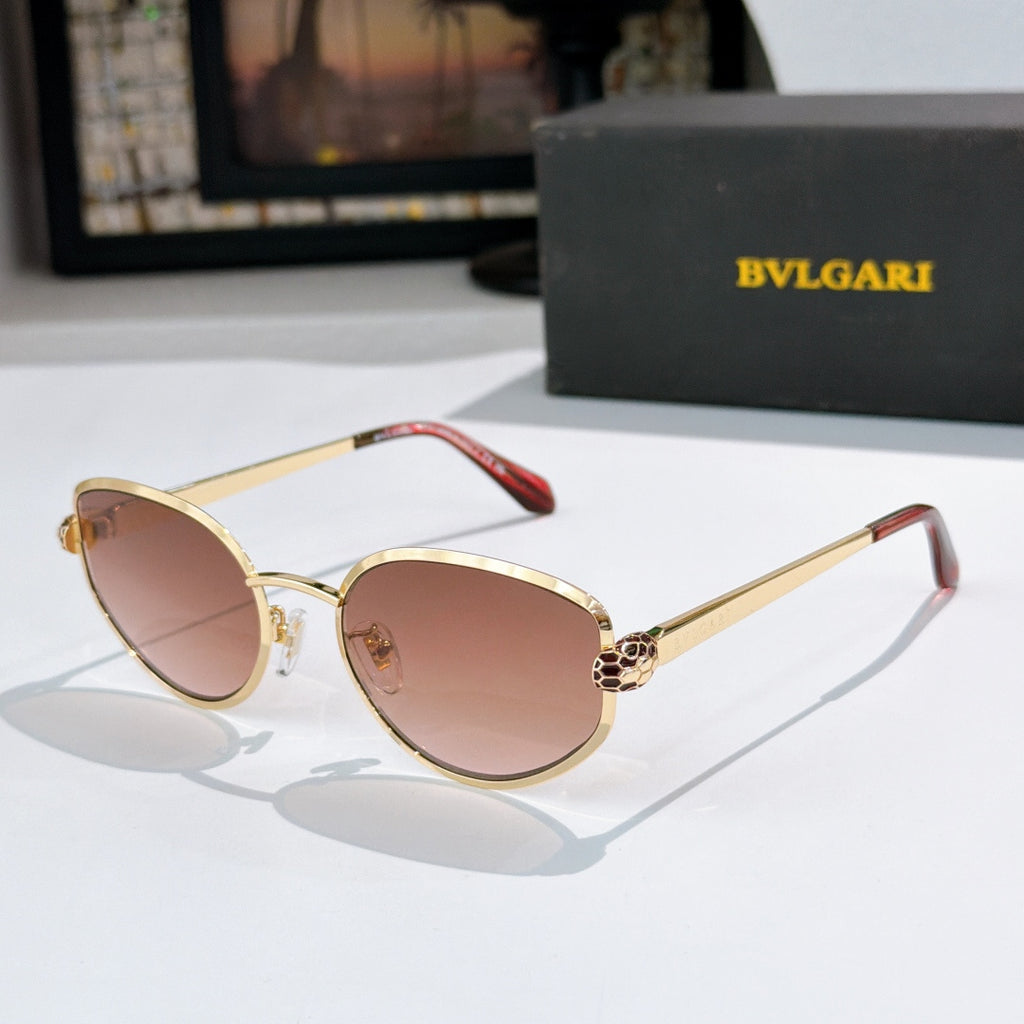 Bvlgari cat-eye glasses with gold frame and pink tinted lenses