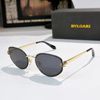Bvlgari cat-eye glasses with gold frame and dark gray tinted lenses