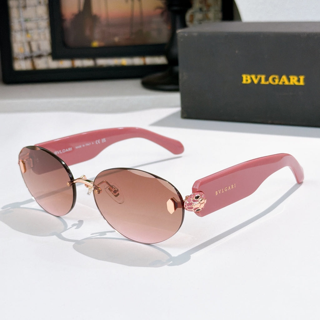 Sunglasses with pink temples, rose-brown lenses, gold-tone frame