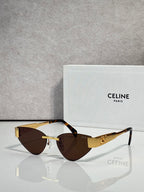 Celine glasses with gold frame, dark brown lenses, and tortoise top edges