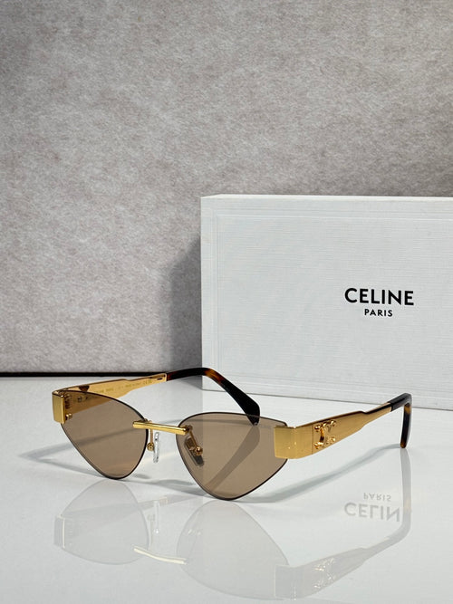 Celine glasses with gold frame and dark brown lenses, front view with black temples