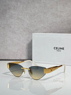 Celine glasses with gold frame, dark blue lenses, and tortoise temple details