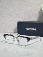 Patterned navy-and-silver eyeglass frames with square clear lenses and silver temple logo