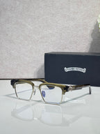 Gold-green and silver eyeglass frames with square clear lenses and rhinestone temple accents