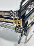 Ornate temple bars with gold accents on blue-tinted eyeglass frame