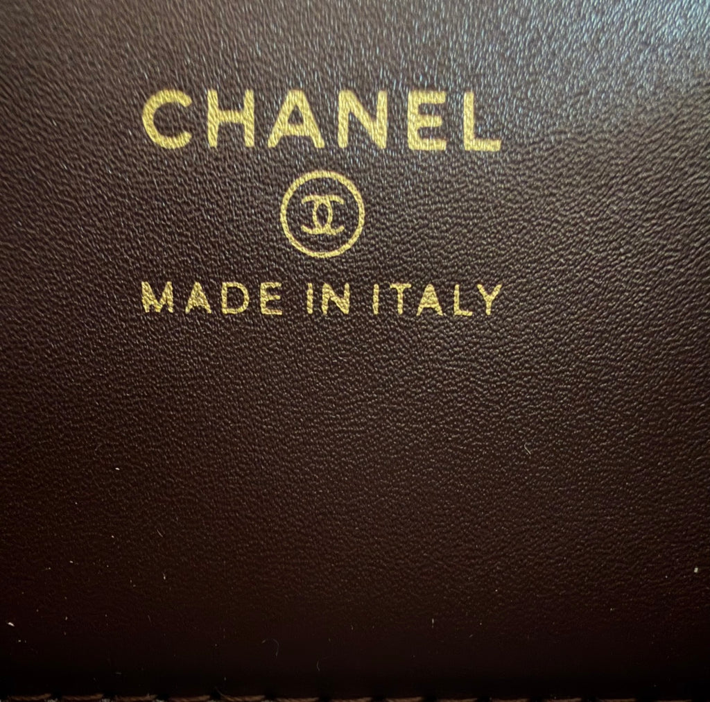 Chanel bag leather stamp reading CHANEL and MADE IN ITALY.