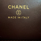 Chanel bag leather stamp reading CHANEL and MADE IN ITALY.