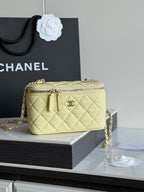 Chanel quilted mini crossbody bag, pale yellow, gold chain strap and rounded top zipper