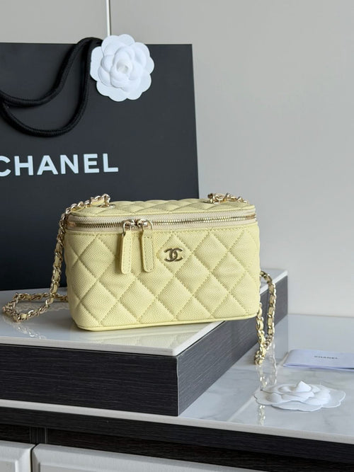 Chanel quilted mini crossbody bag, pale yellow, gold chain strap and rounded top zipper