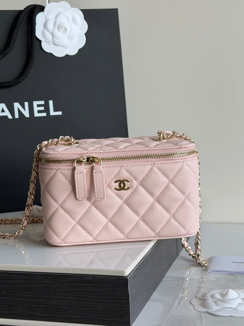 Quilted pale pink crossbody bag with gold chain strap and round CC logo.