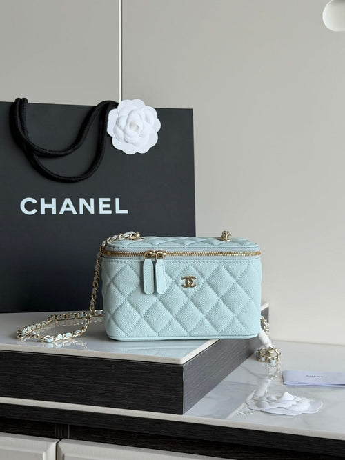 Chanel quilted mini bag in light blue with gold chain strap and zip closure
