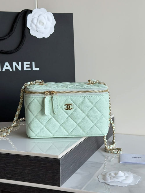 Mint quilted small crossbody bag with gold-tone hardware, top zip, and chain strap