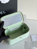 Mint quilted crossbody bag open interior with card slots and top zip closure