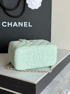 Mint quilted small crossbody bag with embossed CC logo on front and chain strap