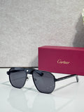Cartier black aviator sunglasses with dark gray lenses and clear temples
