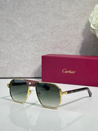 Cartier gold aviator sunglasses with green-tinted lenses and dark temples