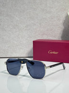 Cartier navy aviator sunglasses with dark blue lenses and gold details