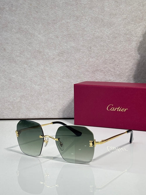 Gold-framed sunglasses with green-tinted lenses and dark bridge detail