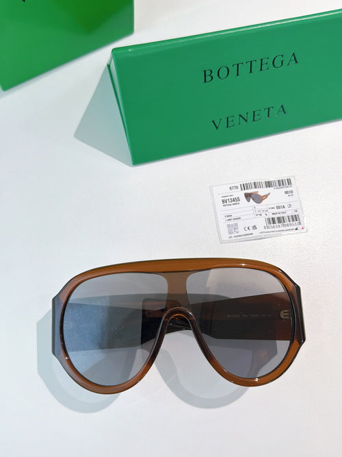 Bottega Veneta aviator sunglasses with brown tortoise frames and dark lenses