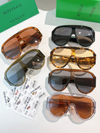 Bottega Veneta sunglasses assorted on display: tortoiseshell and black frames