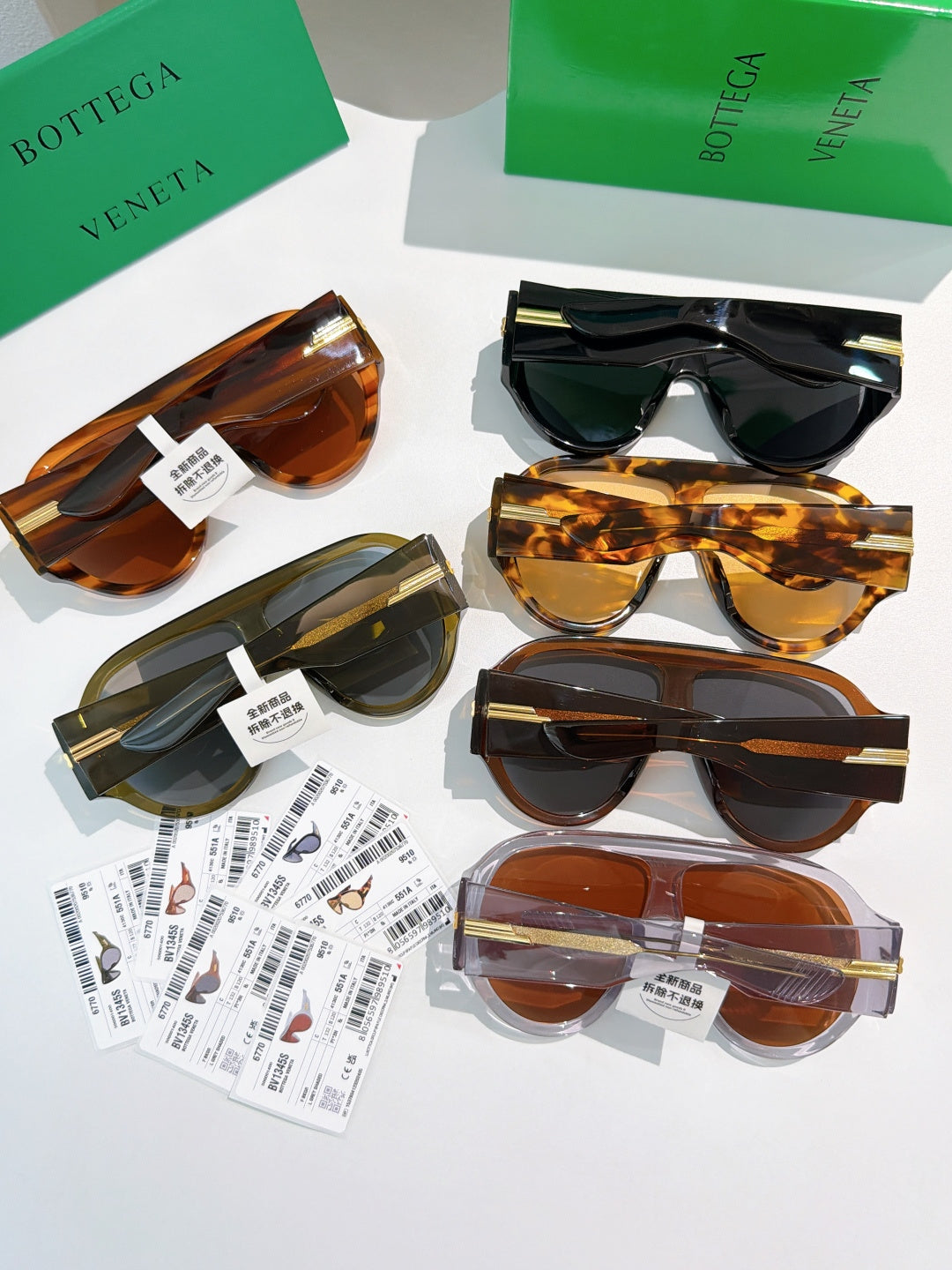 Bottega Veneta sunglasses assortment with black, tortoise, and amber frames