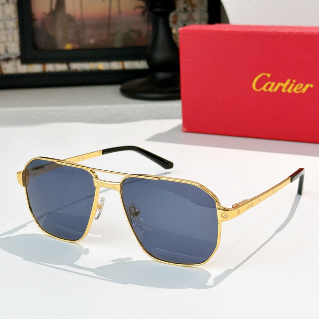 Cartier sunglasses with gold frame and dark blue lenses, aviator style.