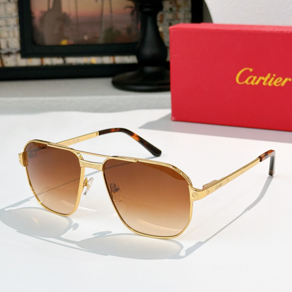 Cartier sunglasses with gold frame and amber-brown lenses, aviator style.