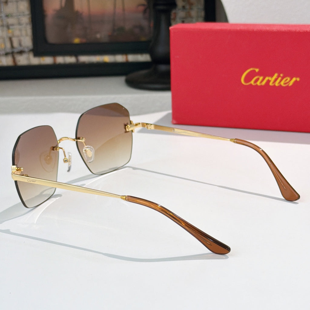 Cartier sunglasses with brown tinted lenses and gold metal frame, side view with arms