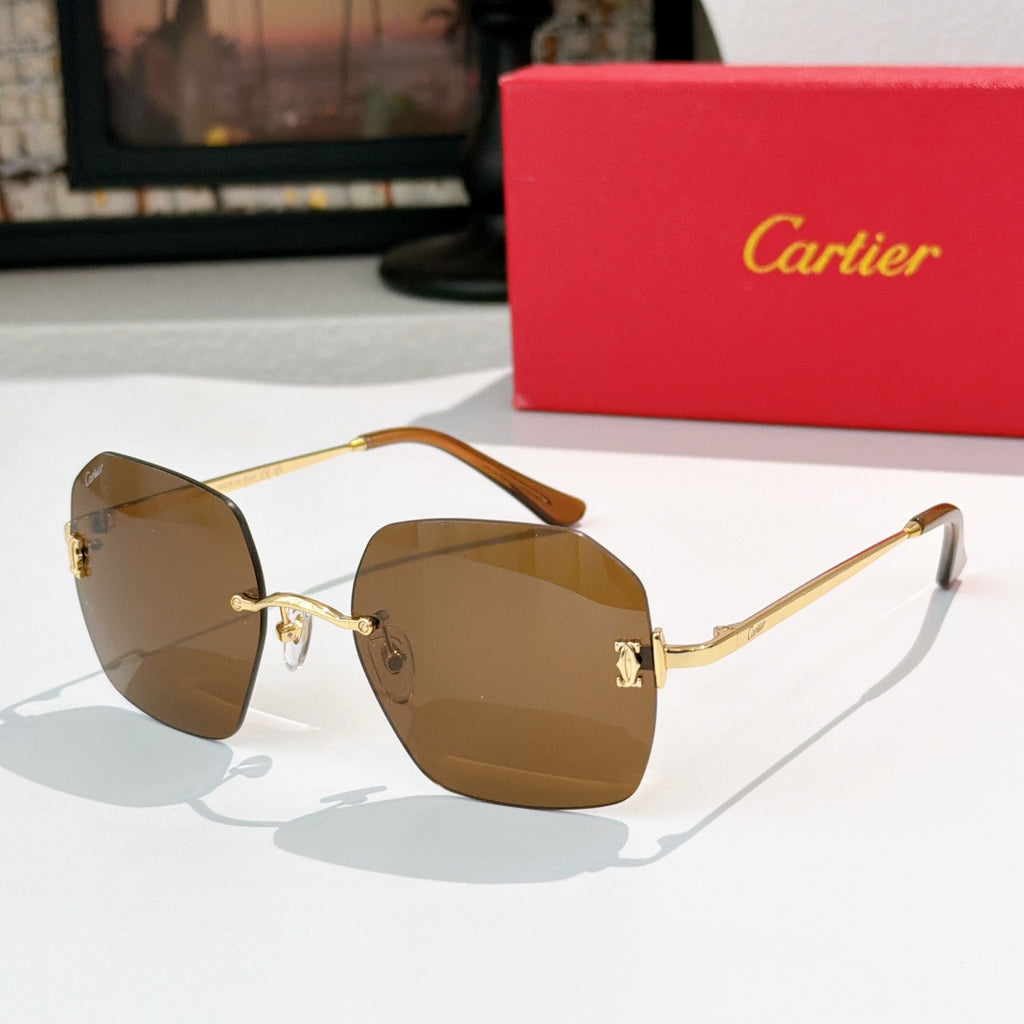 Cartier sunglasses with brown tinted lenses and gold metal frame, front view