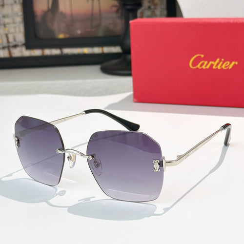 Cartier sunglasses with purple tinted lenses and gold metal frame, front view
