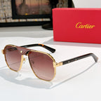 Cartier sunglasses with brown-gold frames, gold bridge, and mauve tinted lenses.