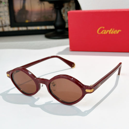 Cartier glasses with burgundy round frames and gold-tone hinges