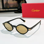 Cartier glasses with black round frames and tinted lenses