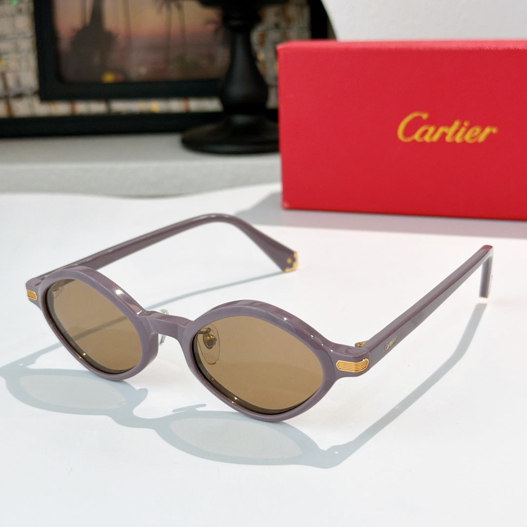 Cartier glasses with mauve round frames and gold-tone hinges